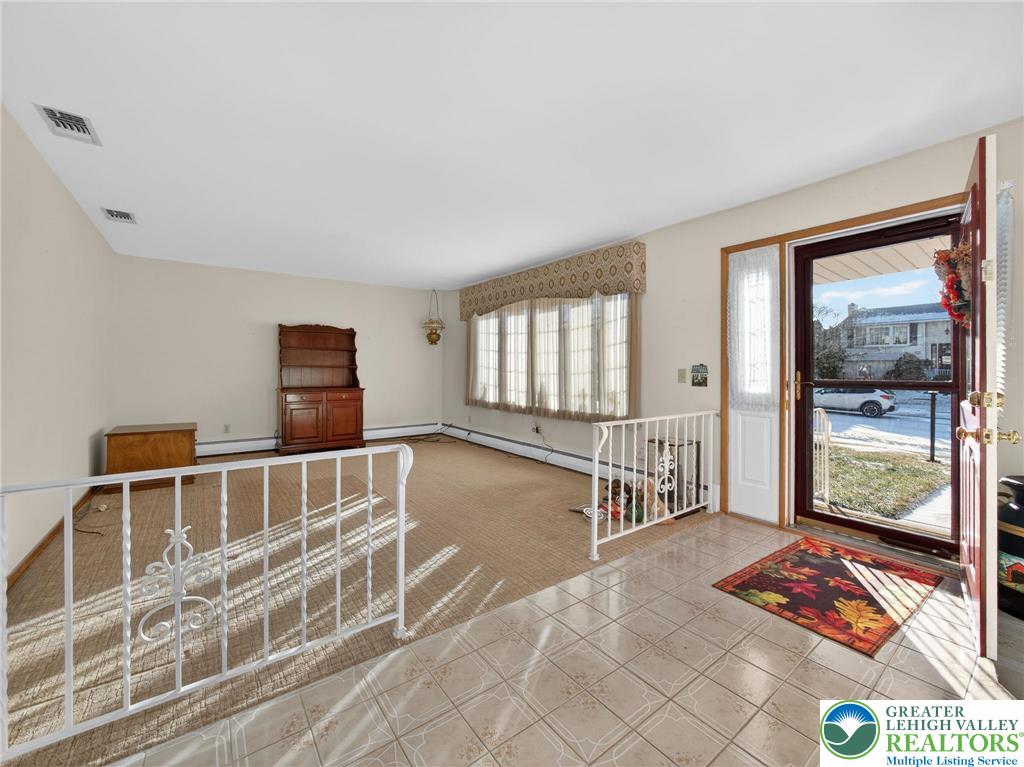 481 Forrest Avenue Bethlehem, PA 18017 - Photo 4 of 32 a bedroom with furniture and large window