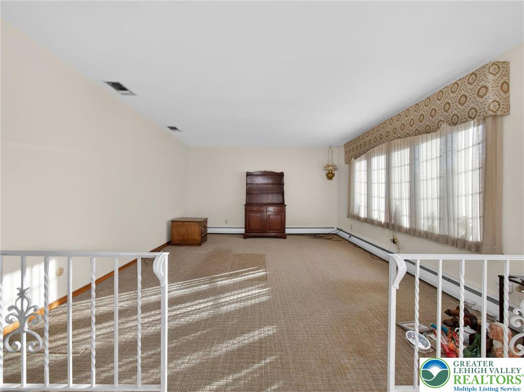 481 Forrest Avenue Bethlehem, PA 18017 - Photo 5 of 32 a view of an empty room with windows