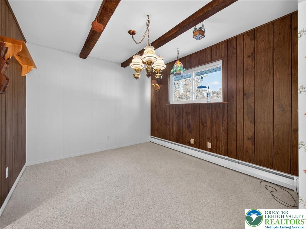 481 Forrest Avenue Bethlehem, PA 18017 - Photo 7 of 32 a view of a chandelier fan and a window