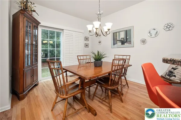 a kitchen with stainless steel appliances granite countertop a stove refrigerator and microwave