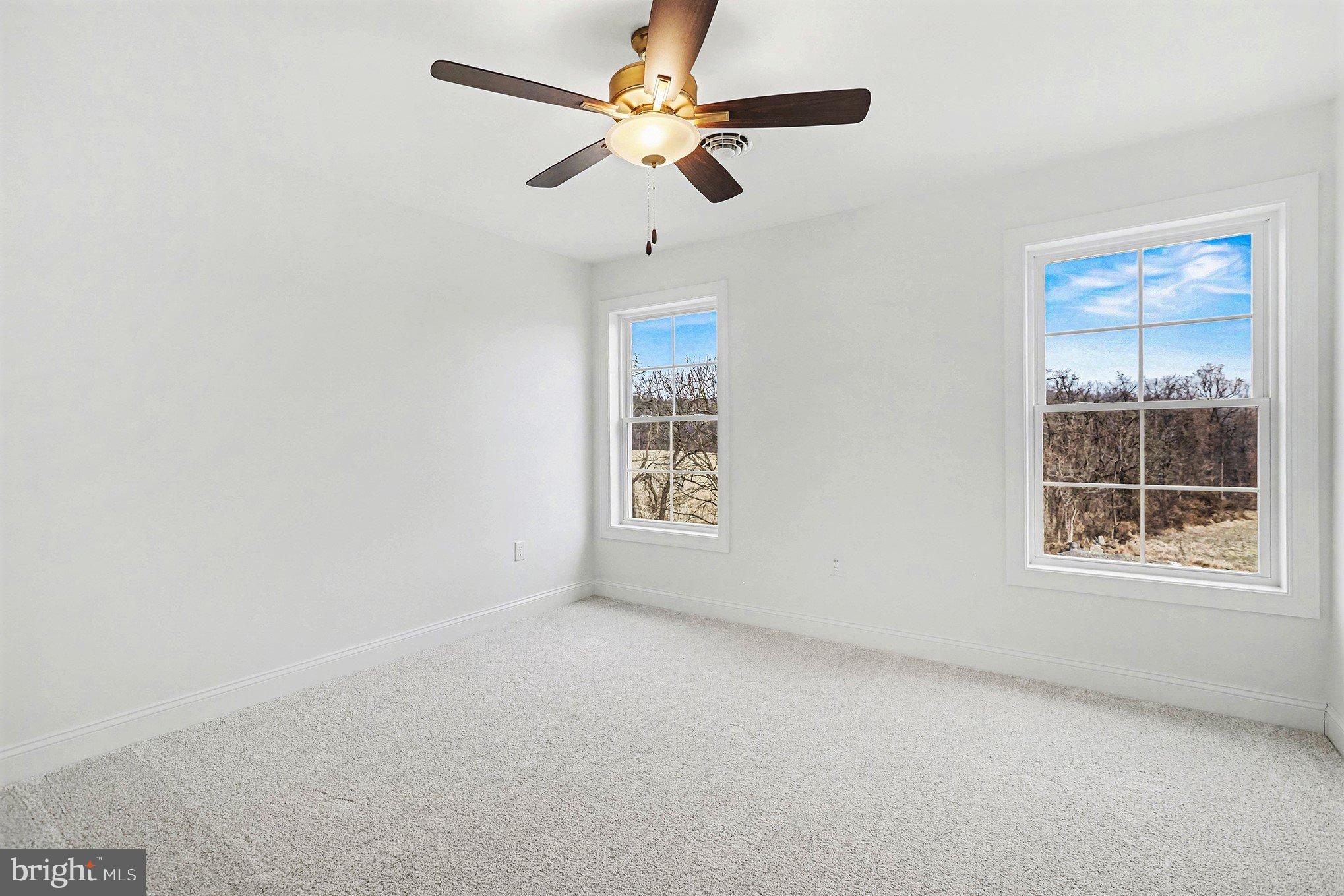 1335 York Haven Road York Haven, PA 17370 - Photo 31 of 46 an empty room with a window and a fan