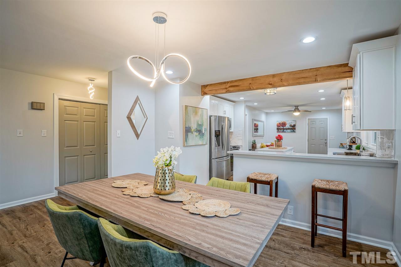 1105 Paddock Drive Raleigh, NC 27609 - Photo 15 of 30 a view of a dining room with furniture