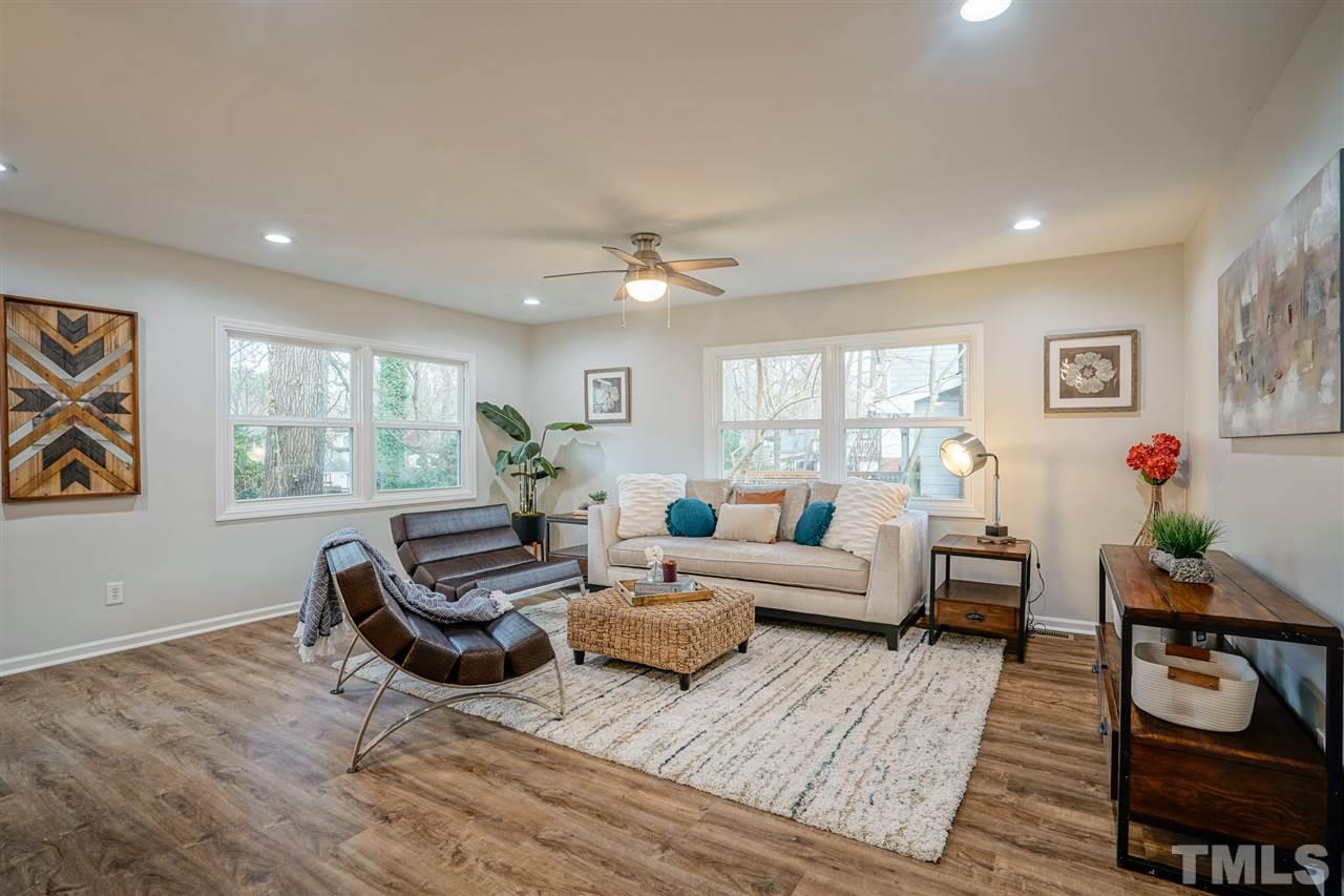 1105 Paddock Drive Raleigh, NC 27609 - Photo 17 of 30 a living room with furniture and a window