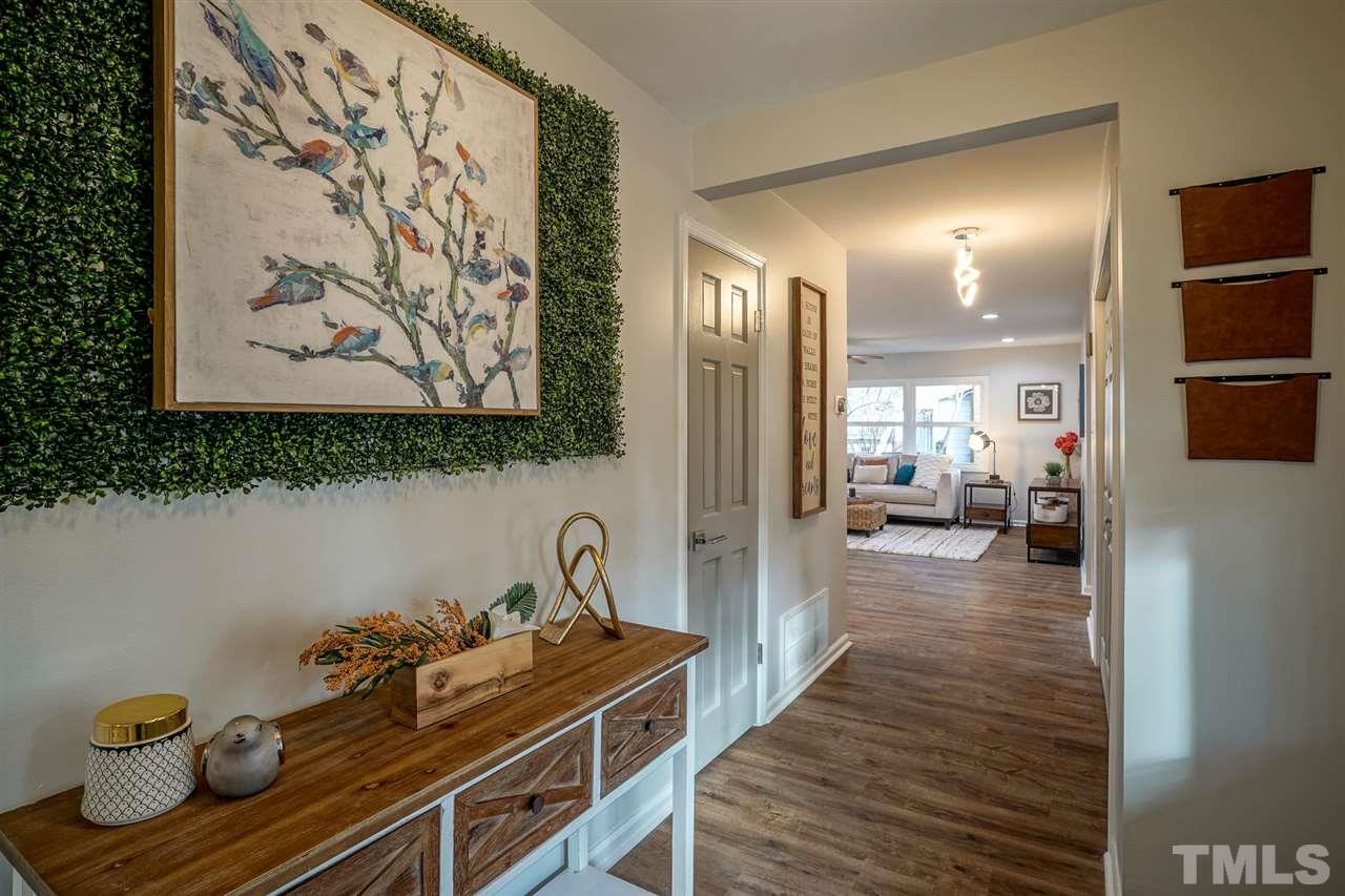 1105 Paddock Drive Raleigh, NC 27609 - Photo 5 of 30 a very nice looking room with wooden floor