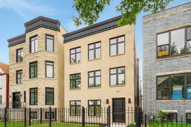 a front view of a multi story residential apartment building