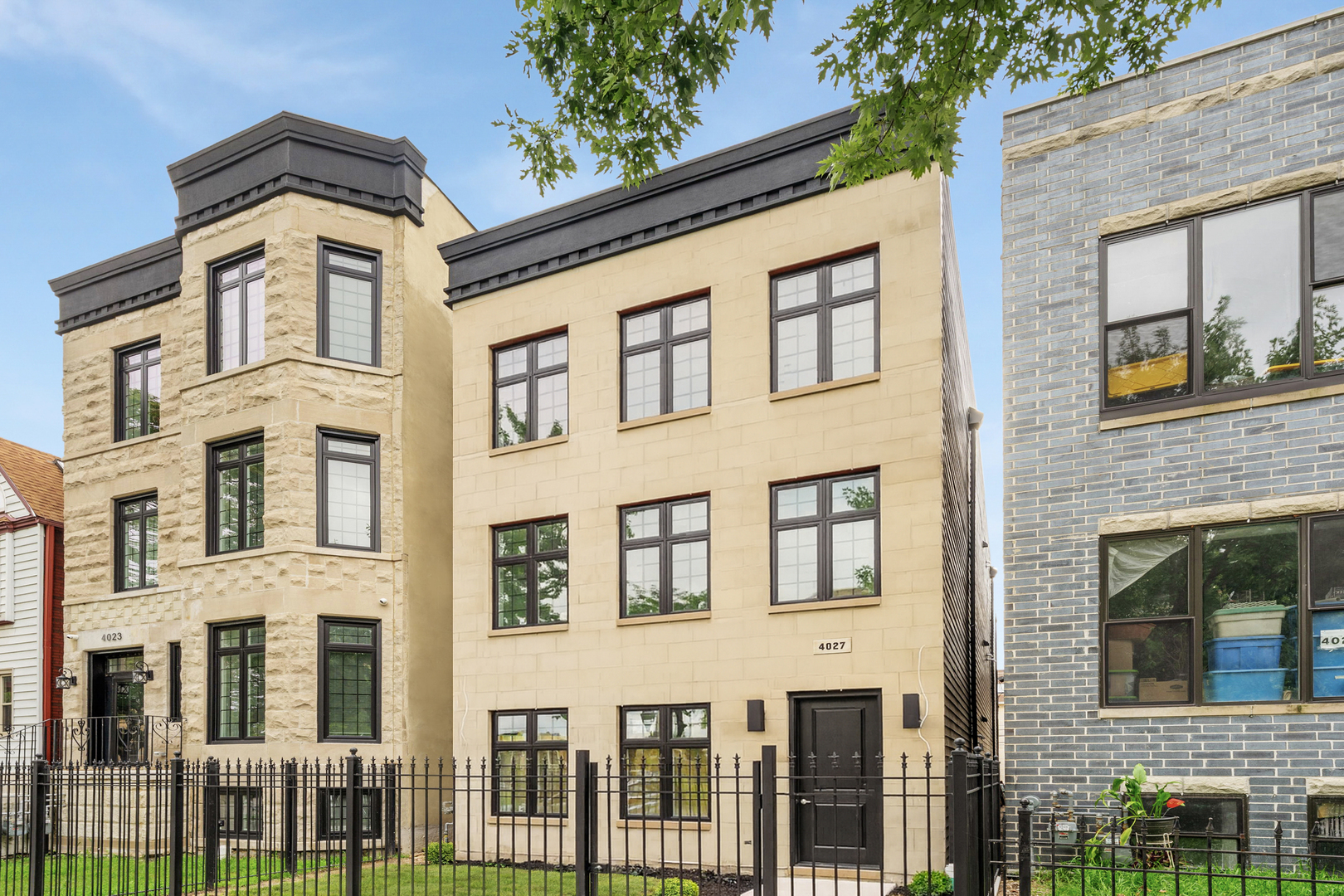 4027 South Vincennes Avenue, Unit 2 Chicago, IL 60653 - Photo 1 of 19 a front view of a multi story residential apartment building