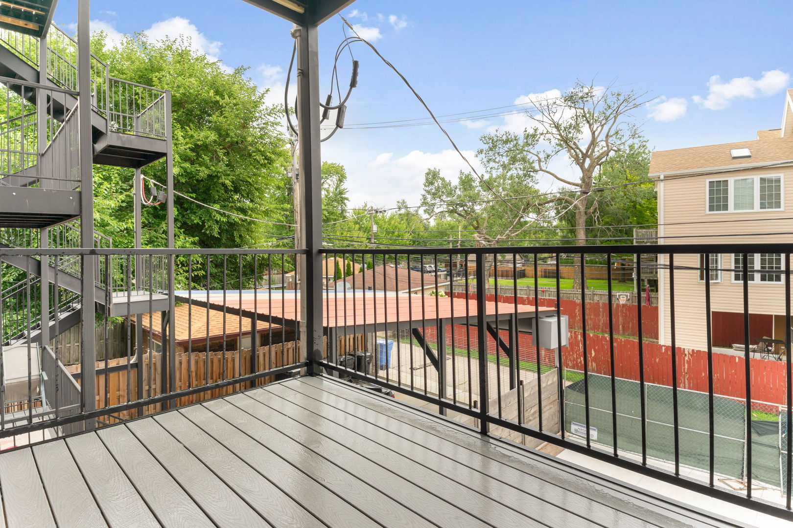 4027 South Vincennes Avenue, Unit 2 Chicago, IL 60653 - Photo 15 of 19 a view of balcony with wooden floor
