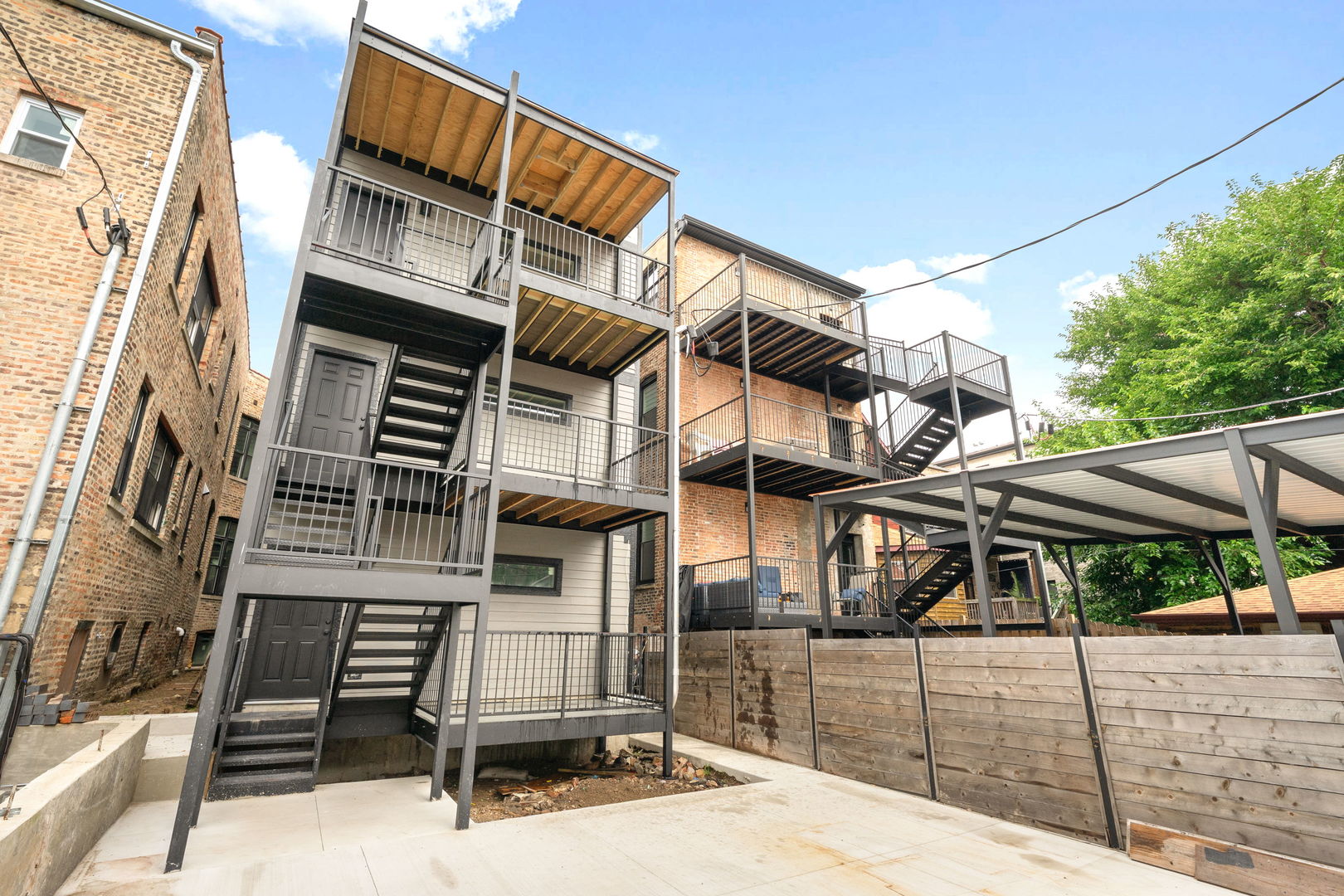 4027 South Vincennes Avenue, Unit 2 Chicago, IL 60653 - Photo 16 of 19 a view of a house with iron stairs