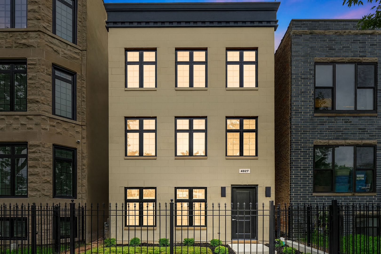 4027 South Vincennes Avenue, Unit 2 Chicago, IL 60653 - Photo 17 of 19 a building with a lot of windows