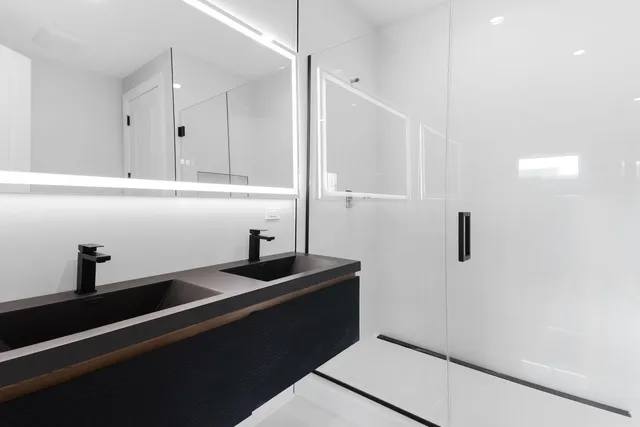 a kitchen with a sink and cabinets