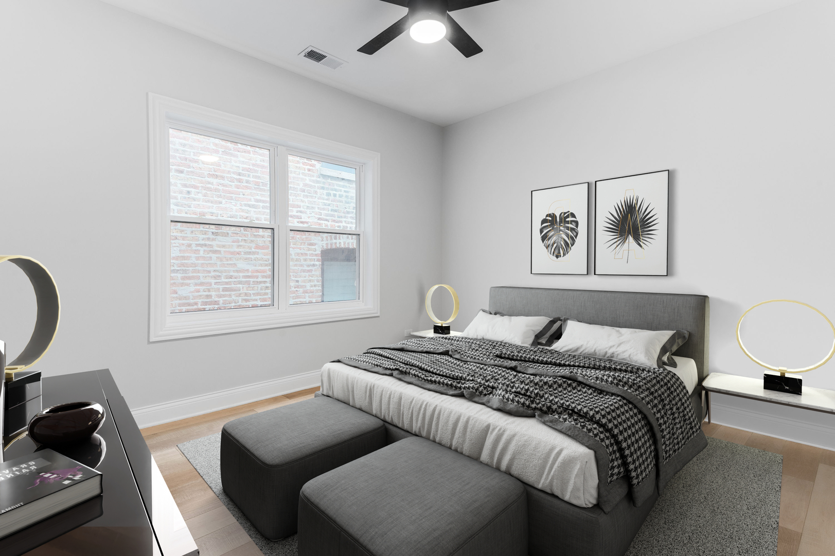 4027 South Vincennes Avenue, Unit 2 Chicago, IL 60653 - Photo 10 of 19 a bedroom with a bed and a couch