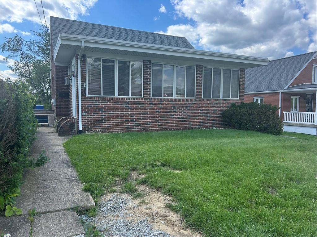 314 Terrace McKeesport, PA 15135 - Photo 1 of 19 a view of house with backyard and garden