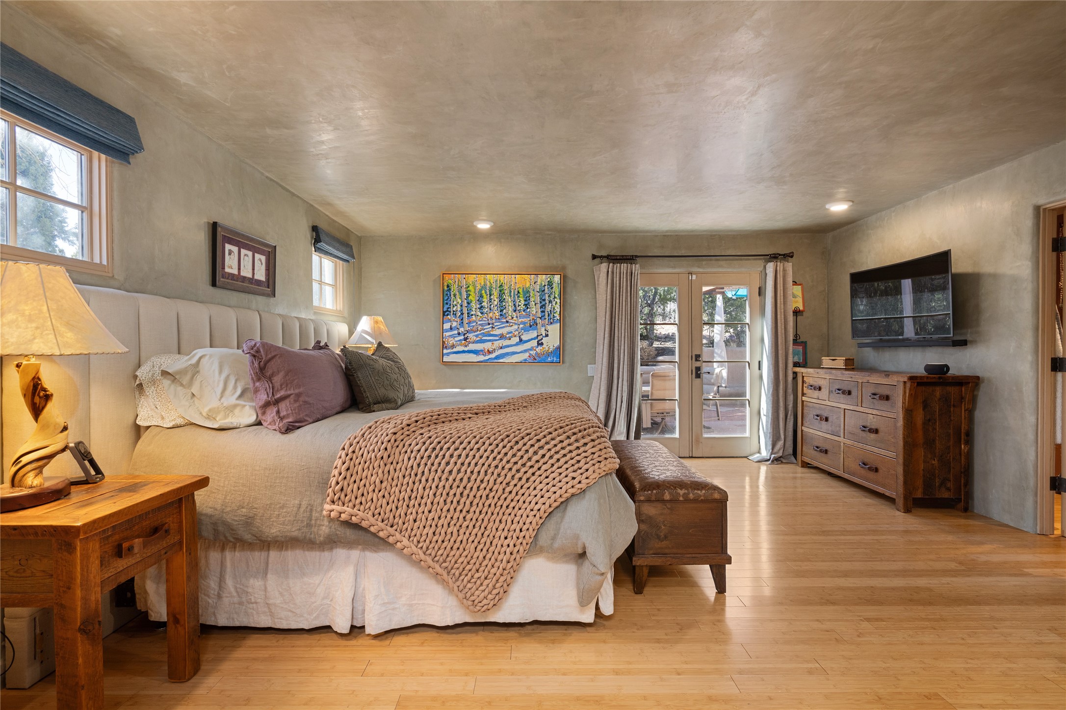 1204 Bandolina Road Santa Fe, NM 87501 - Photo 21 of 69 Primary bedroom, doors to back patio
