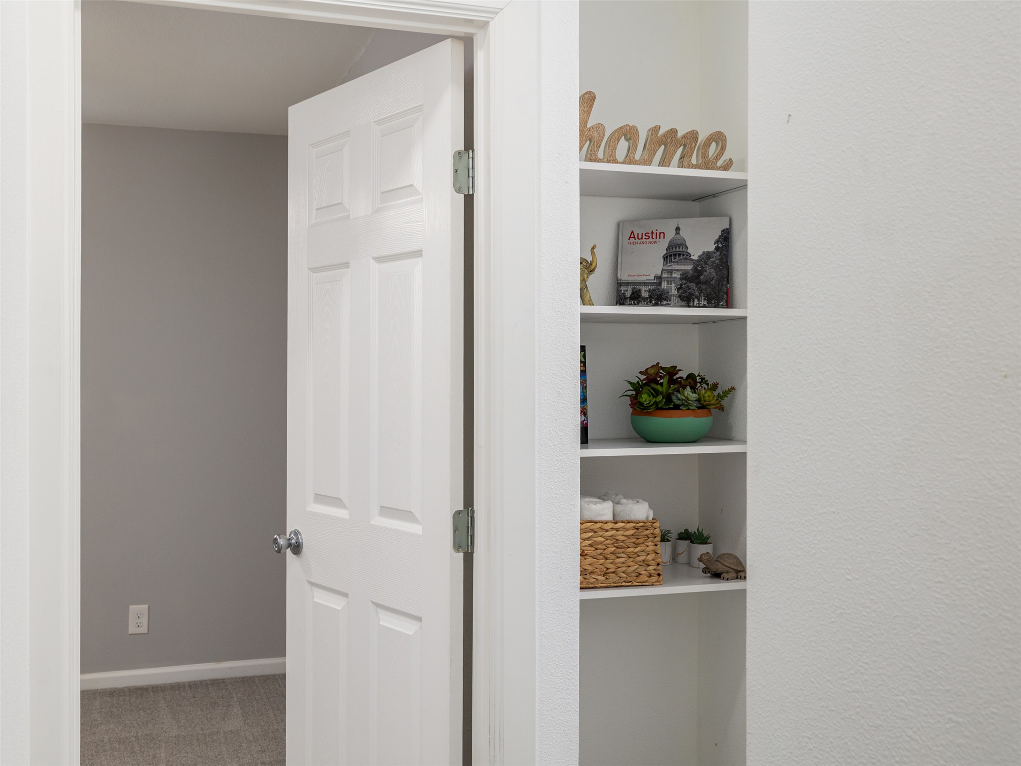 711 Buckingham Place Austin, TX 78745 - Photo 13 of 25 Hallway with additional storage