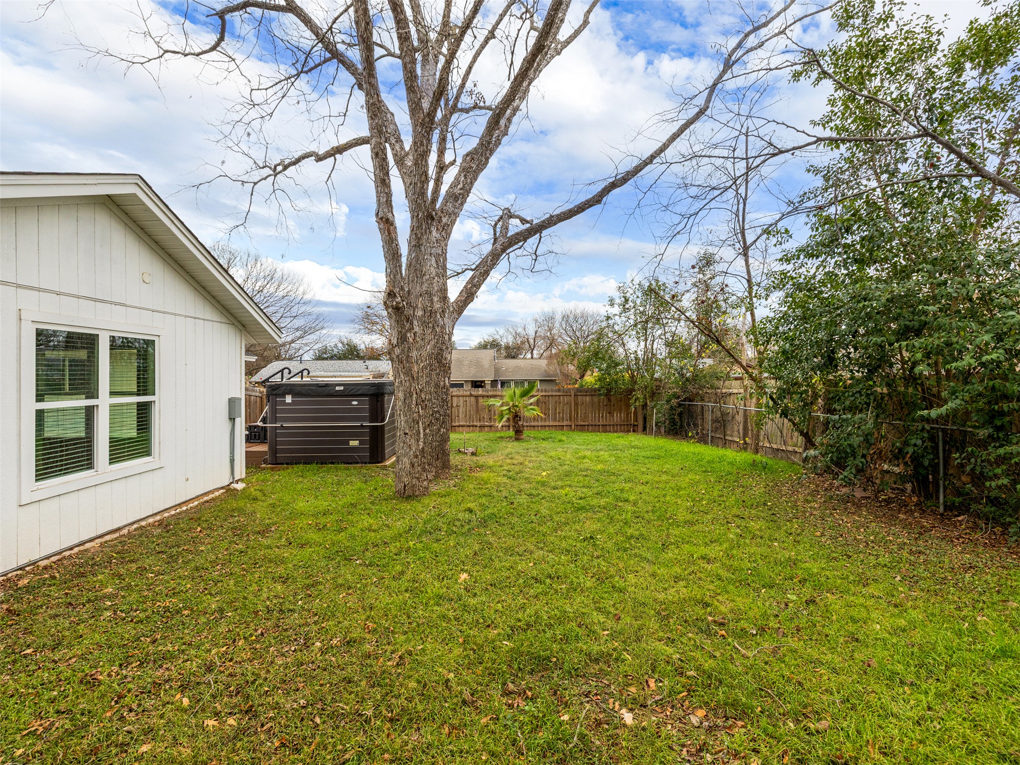 711 Buckingham Place Austin, TX 78745 - Photo 23 of 25 View of fenced backyard