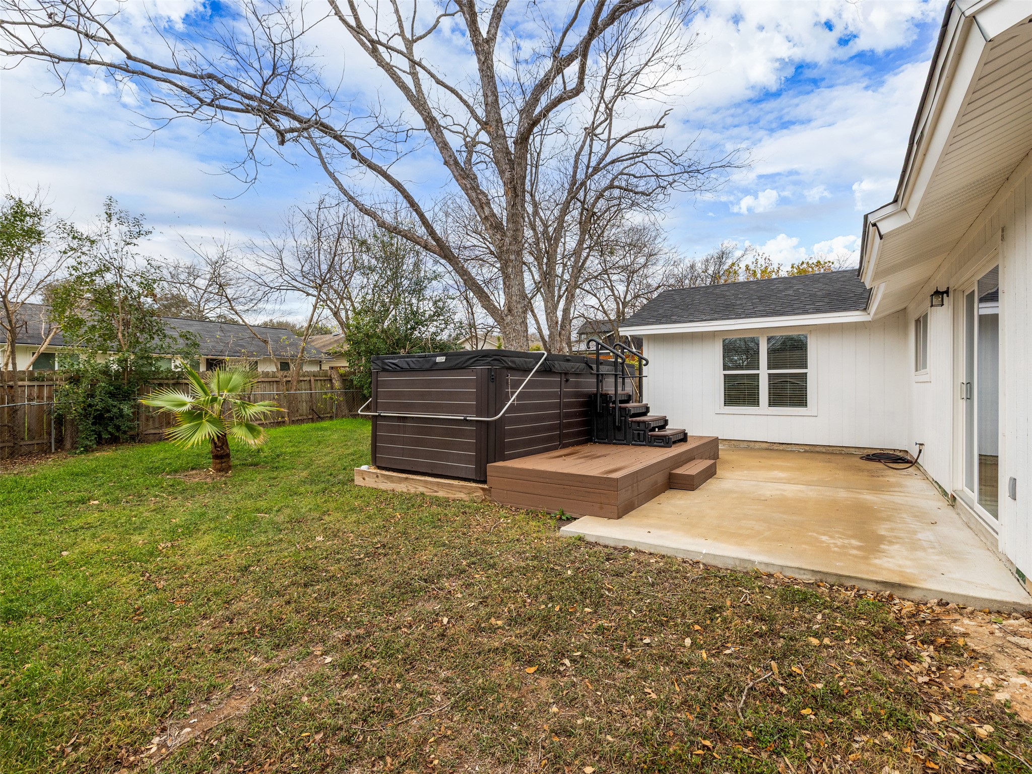 711 Buckingham Place Austin, TX 78745 - Photo 25 of 25 Walk-out back deck leading to a 2025 swim spa
