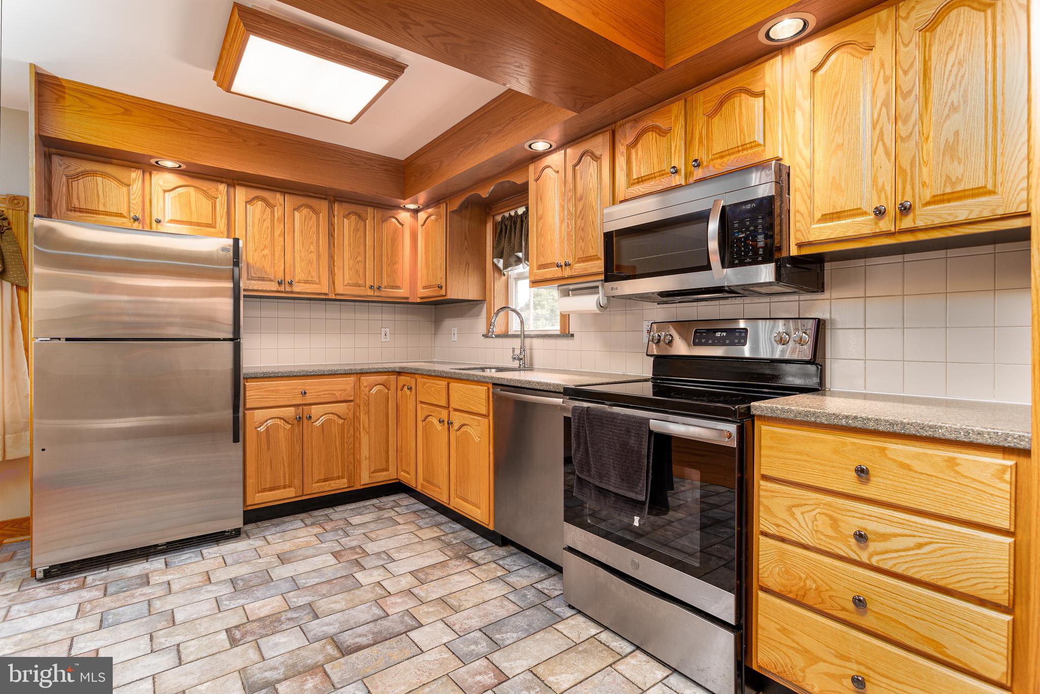 608 Rutledge Avenue Folsom, PA 19033 - Photo 3 of 28 Modern kitchen with tile flooring