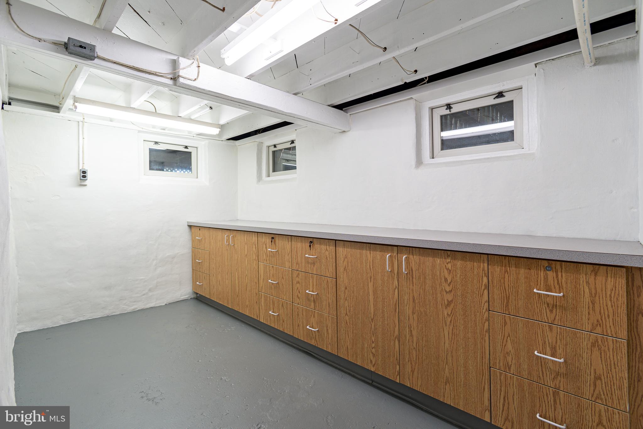 608 Rutledge Avenue Folsom, PA 19033 - Photo 22 of 28 Storage and counter tops in the basement