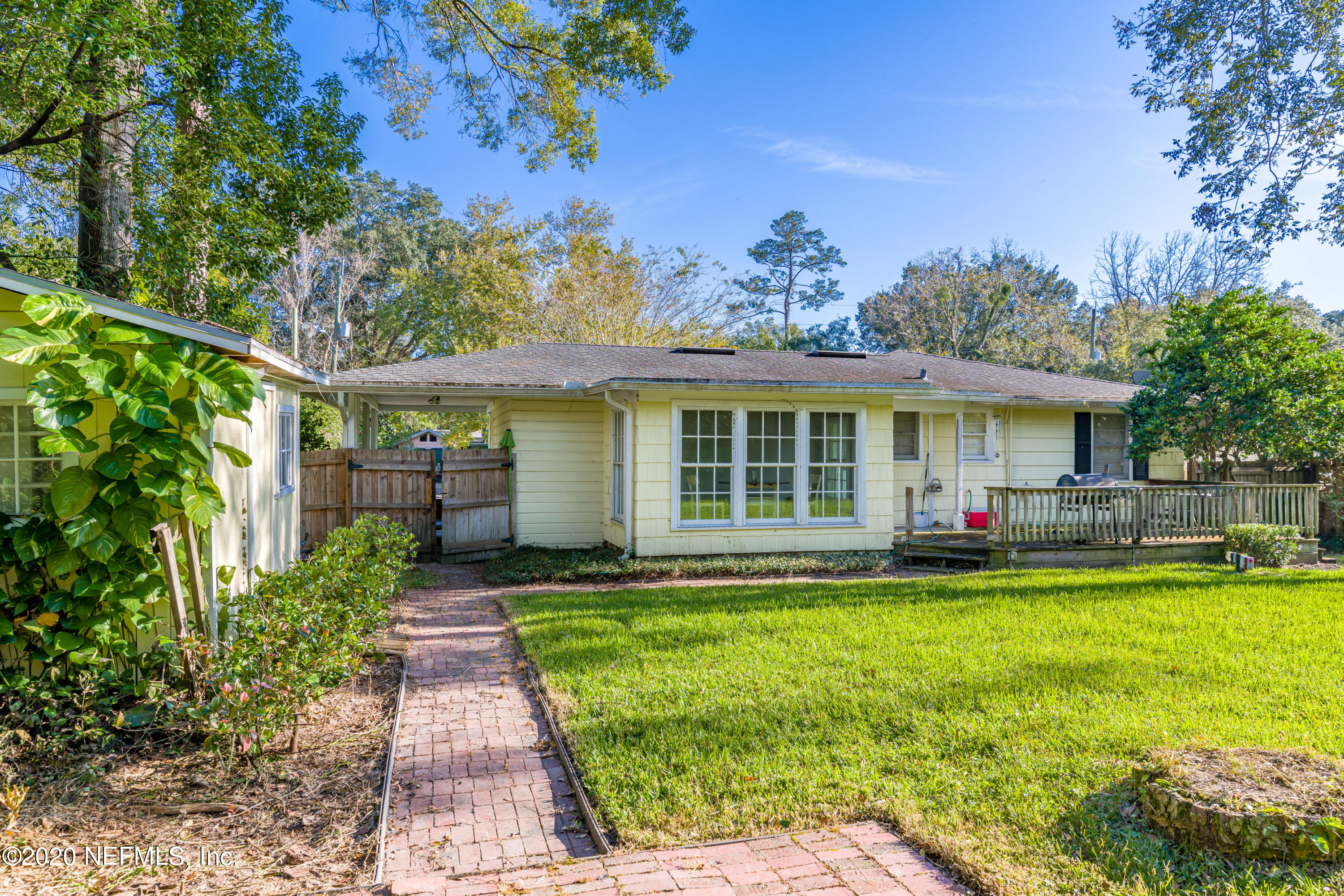 4615 Homestead Road Jacksonville, FL 32210 - Photo 33 of 41 a view of a house with a yard