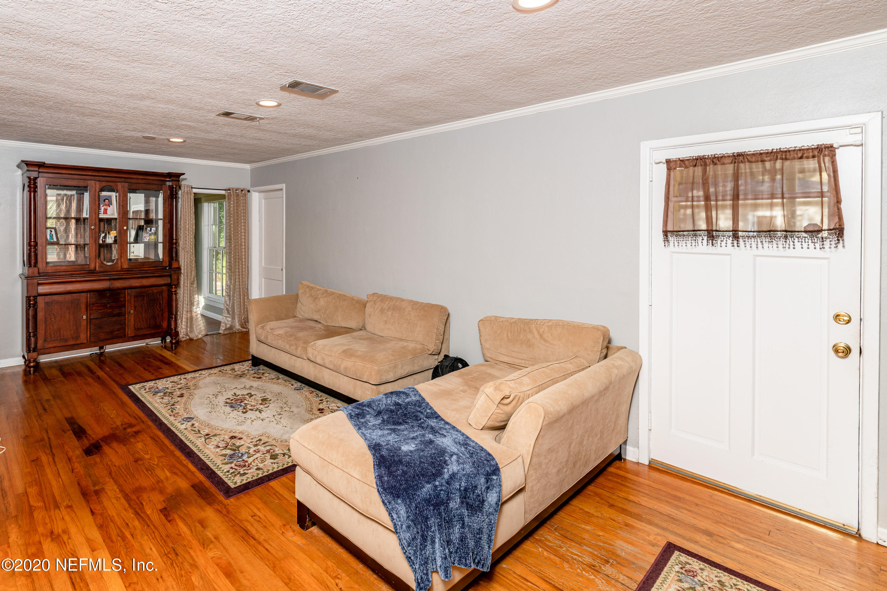 4615 Homestead Road Jacksonville, FL 32210 - Photo 6 of 41 a living room with furniture and a window