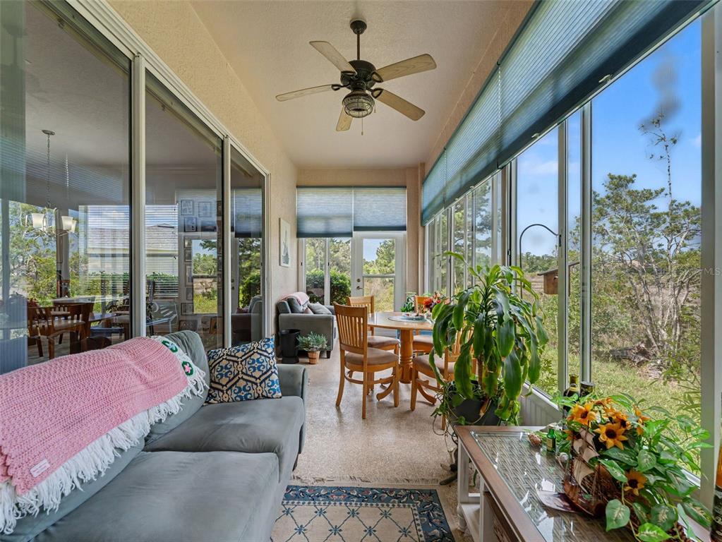 8910 Jericho Road Weeki Wachee, FL 34613 - Photo 46 of 52 a living room with furniture potted plant and a large window