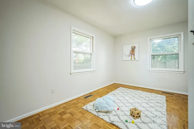 a view of a bedroom with a window