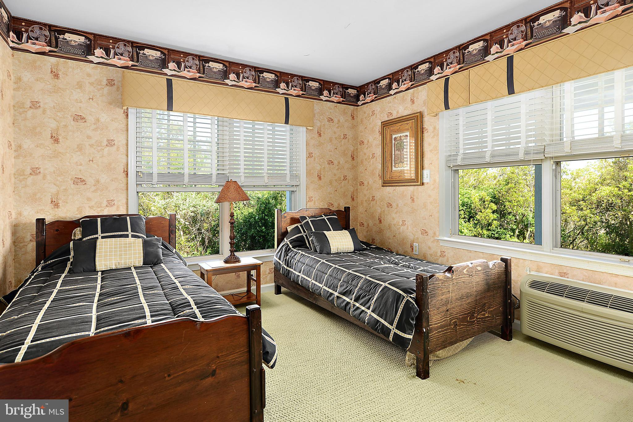 10050 Golf Course Road, Unit 27 Ocean City, MD 21842 - Photo 29 of 43 first floor bedroom and sitting area