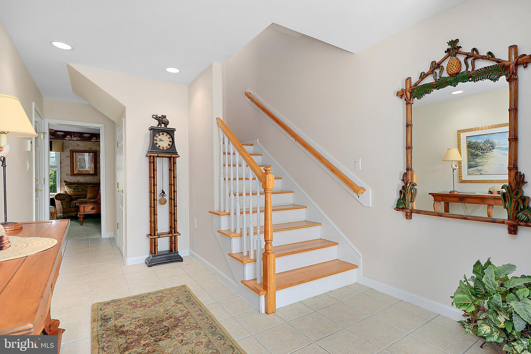 10050 Golf Course Road, Unit 27 Ocean City, MD 21842 - Photo 5 of 43 floyer to first floor bedroom and stairs to main l