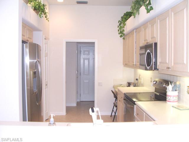 124 Spring Lake Circle Naples, FL 34119 - Photo 3 of 8 Gallery Image 3