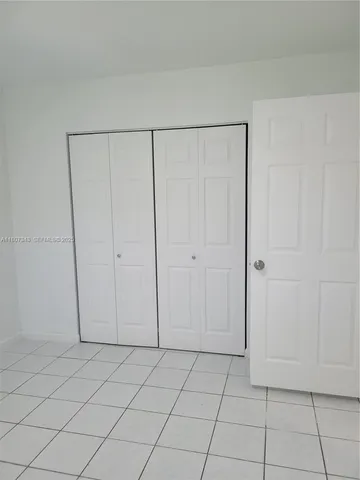 an empty room with a workbench