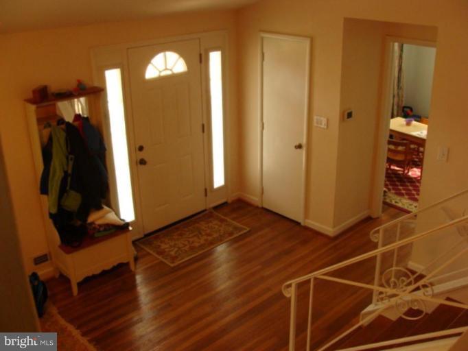 12818 Crisfield Road Silver Spring, MD 20906 - Photo 11 of 21 a view of a room with wooden floor