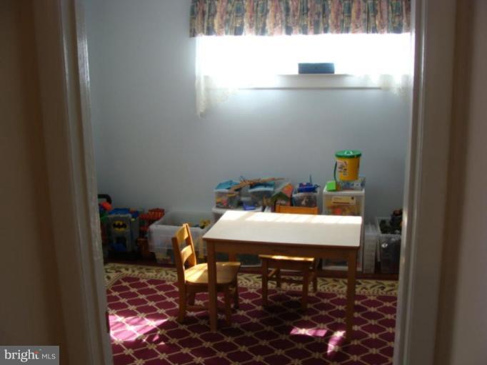 12818 Crisfield Road Silver Spring, MD 20906 - Photo 13 of 21 a view of a dining room with furniture