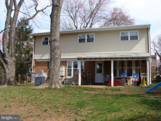 12818 Crisfield Road Silver Spring, MD 20906 - Photo 21 of 21 a view of a yard with a large tree