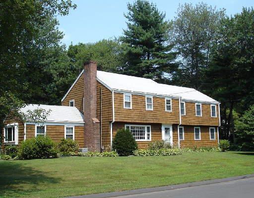 86 Stoneleigh Square Fairfield, CT 06825 - Photo 1 of 1 a front view of a house with a yard