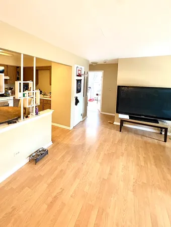 a living room with couch and a flat screen tv