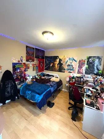 a bed room with gym equipment