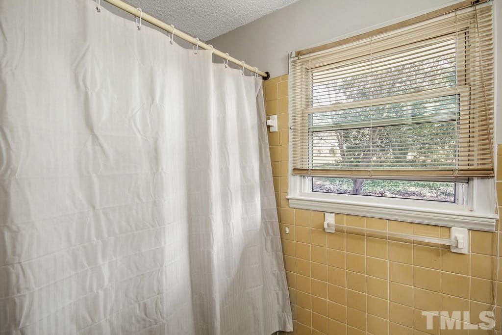 401 Buck Jones Road Raleigh, NC 27606 - Photo 17 of 21 a view of a kitchen with a window