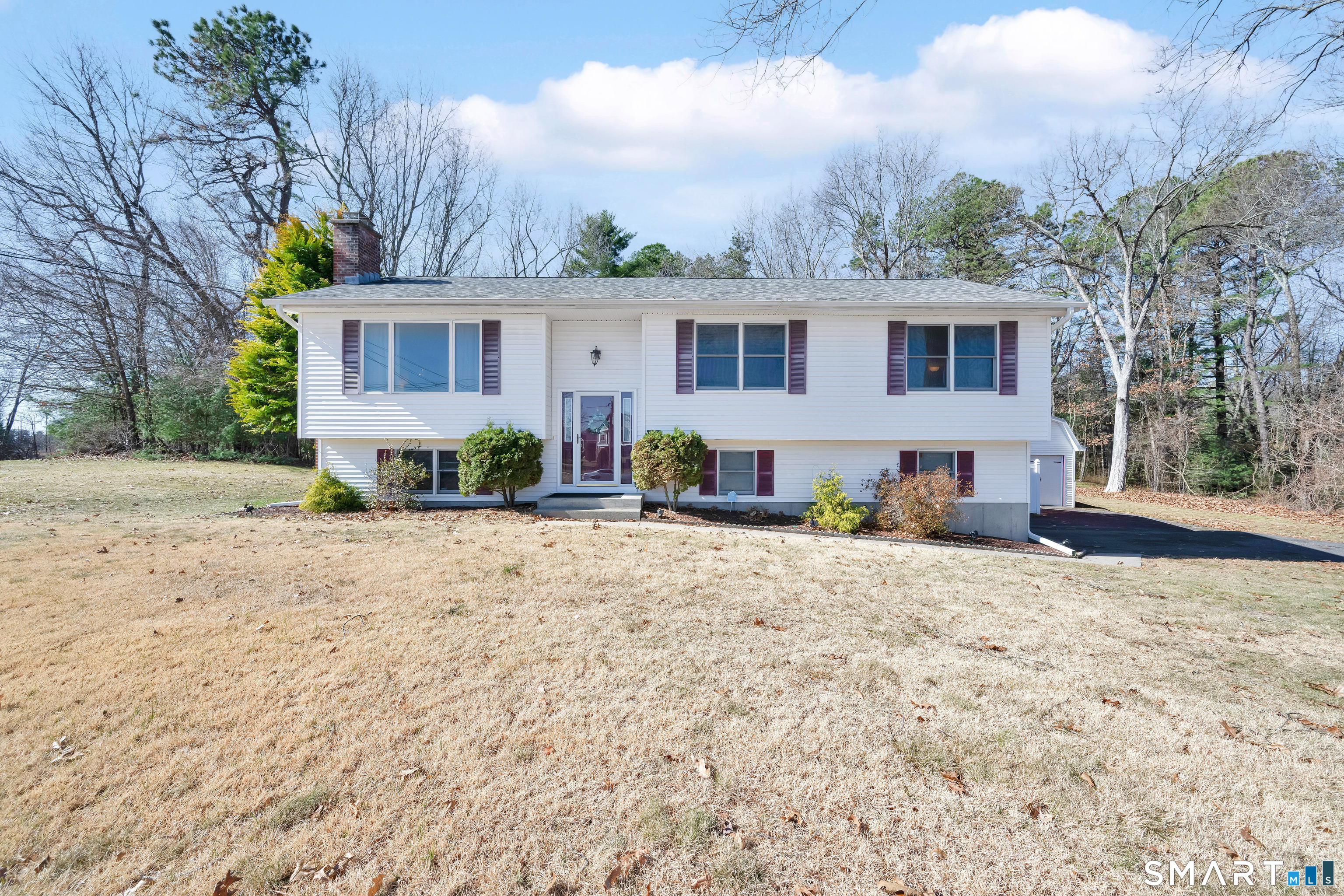 357 North Maple Street Enfield, CT 06082 - Photo 1 of 37 a view of a house with a yard