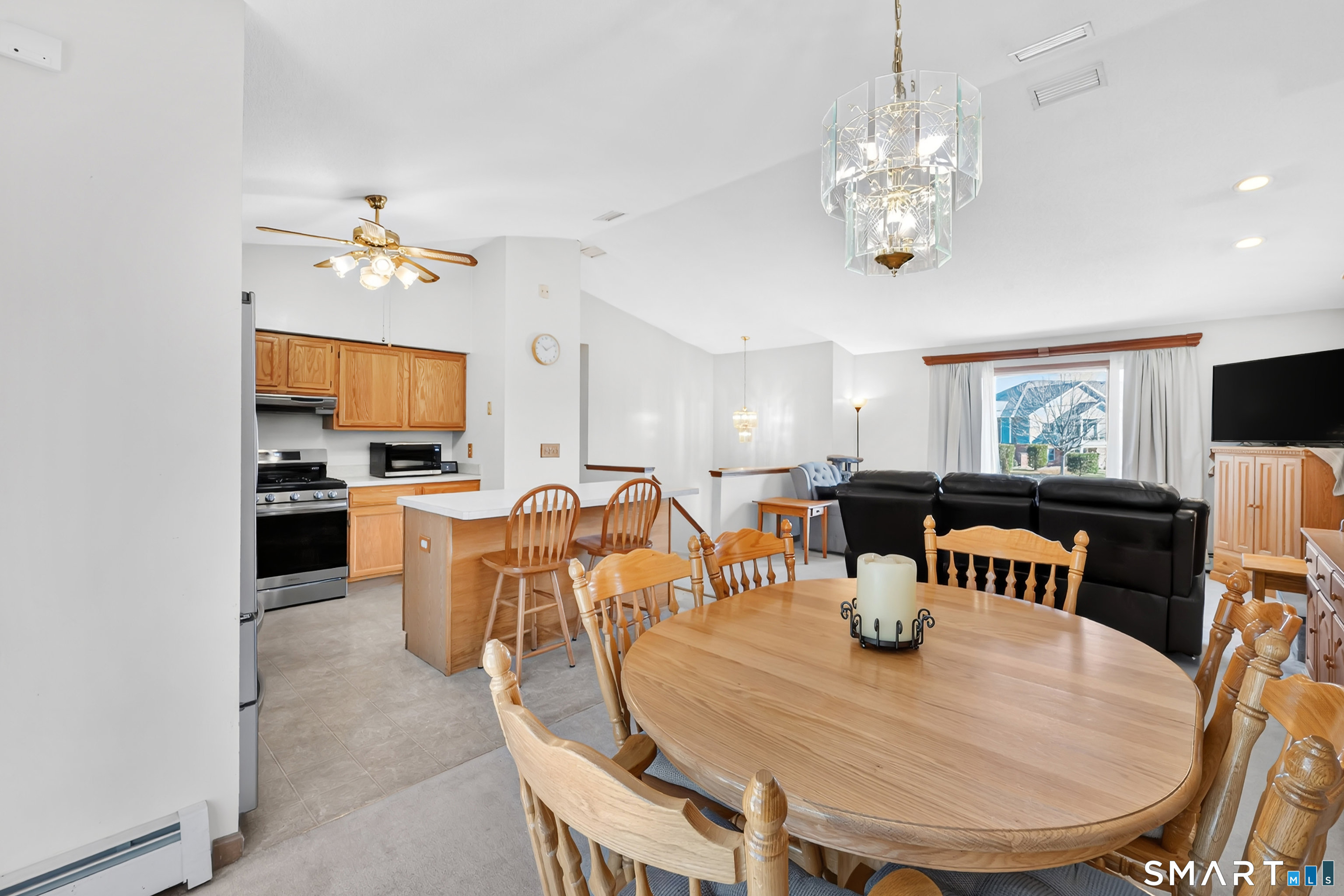 357 North Maple Street Enfield, CT 06082 - Photo 12 of 37 a view of a dining room with furniture