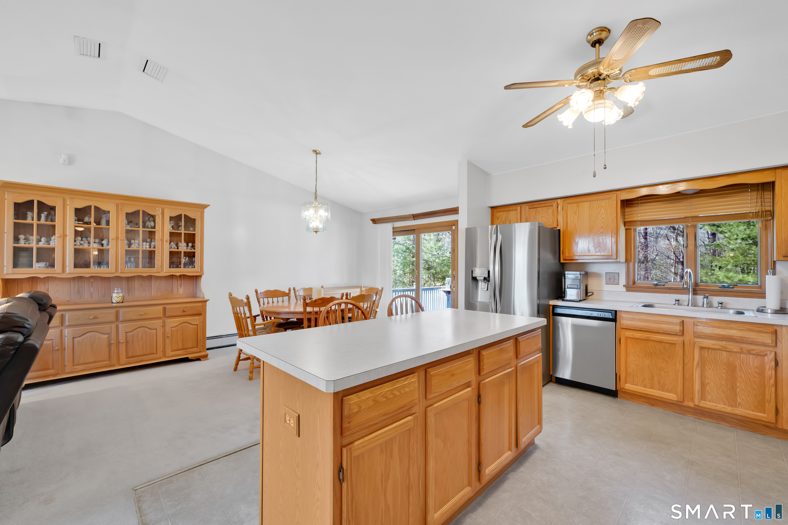 357 North Maple Street Enfield, CT 06082 - Photo 13 of 37 a kitchen with stainless steel appliances a sink stove and cabinets
