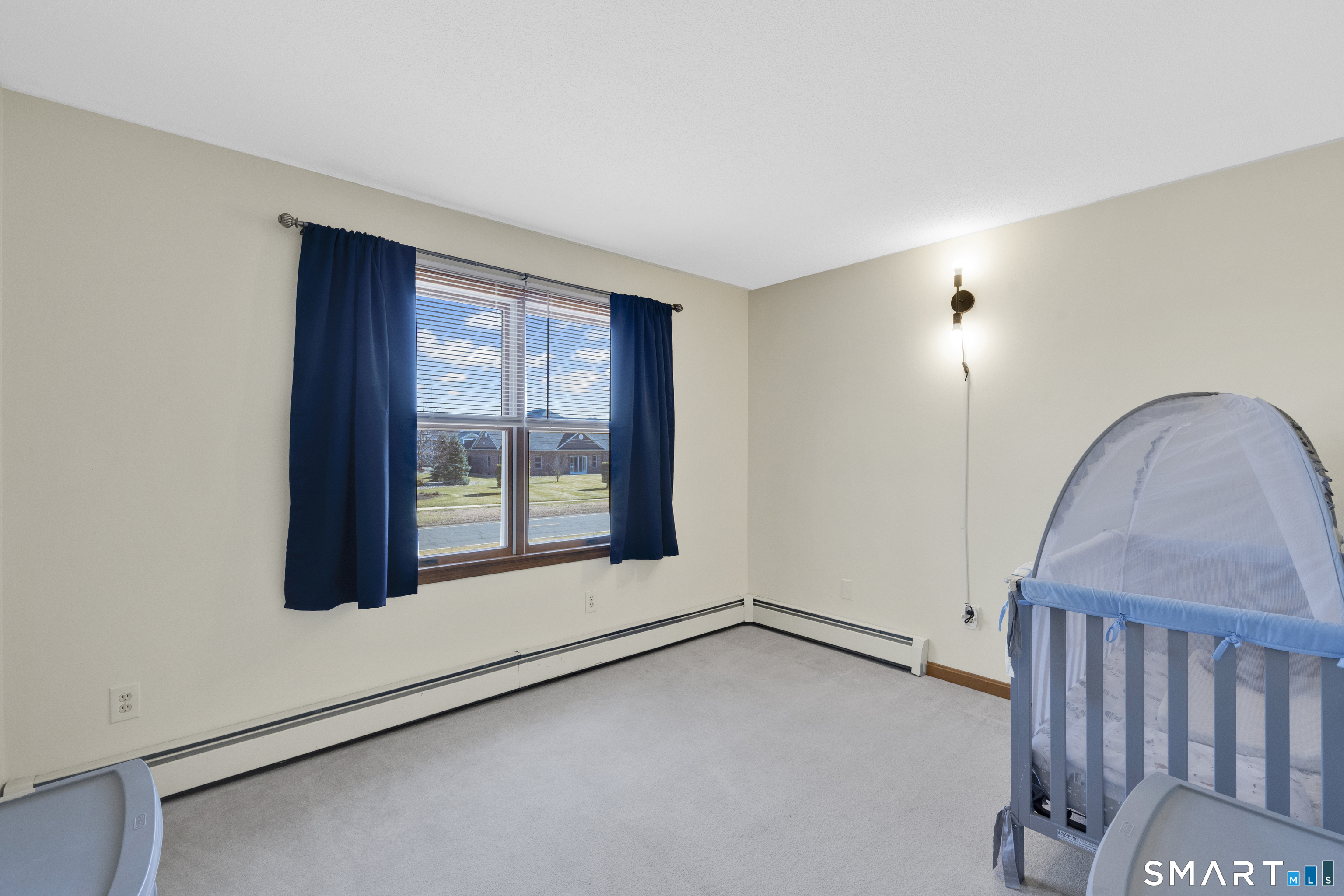 357 North Maple Street Enfield, CT 06082 - Photo 25 of 37 an empty room with windows