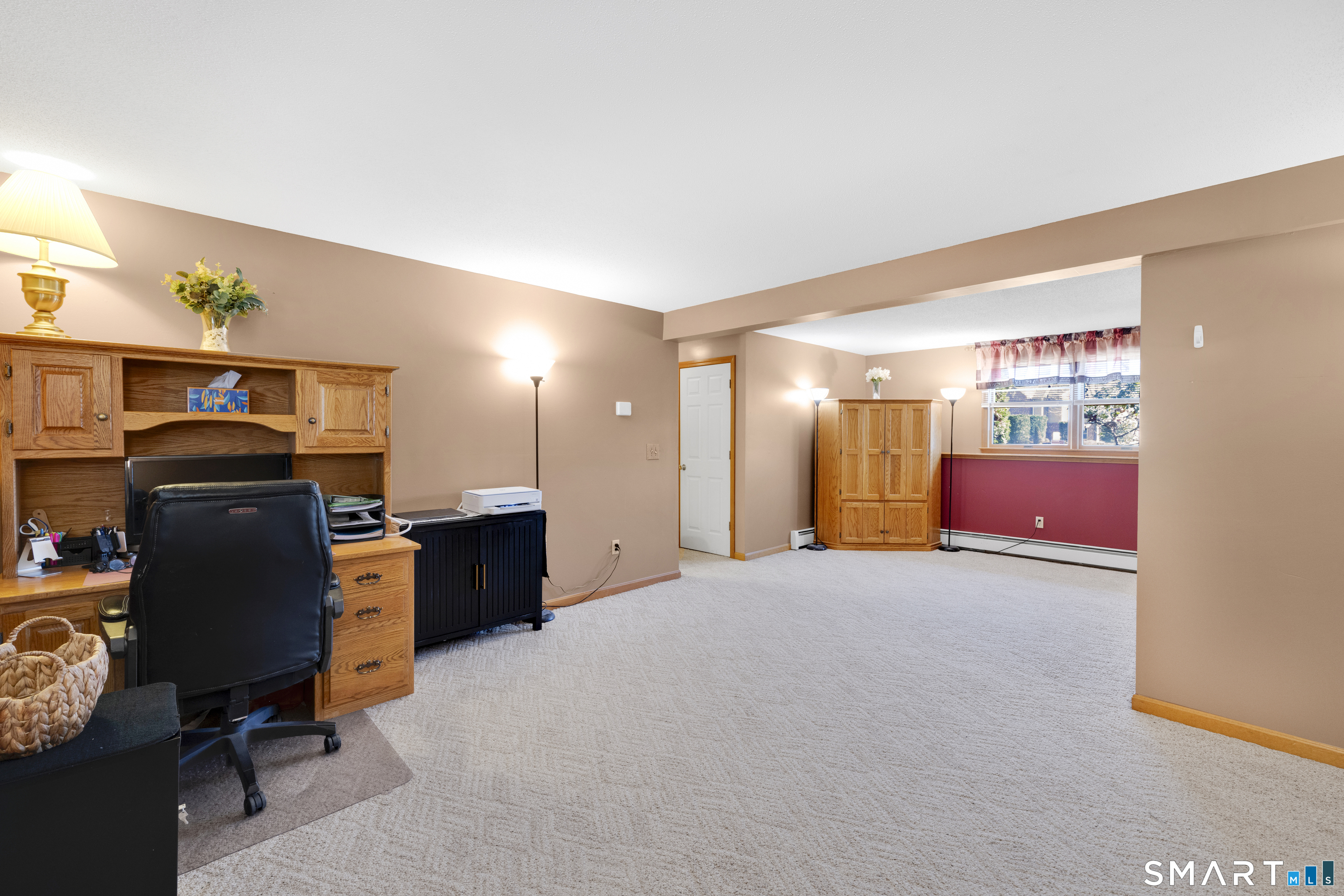 357 North Maple Street Enfield, CT 06082 - Photo 29 of 37 a workspace with furniture and window