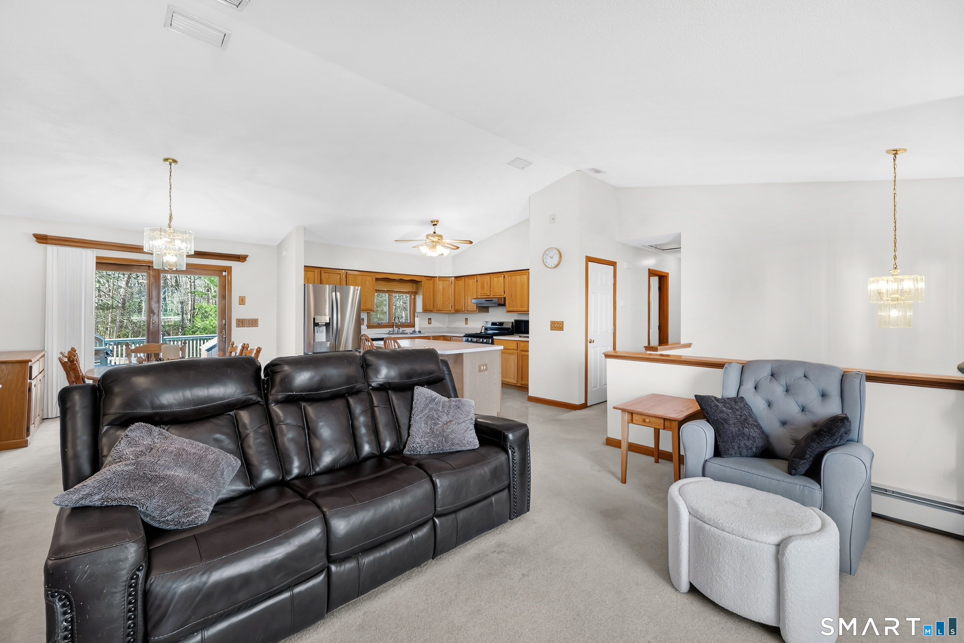 357 North Maple Street Enfield, CT 06082 - Photo 5 of 37 a living room with furniture and a wooden floor