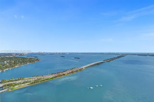 a bedroom with a bed and a walk in closet