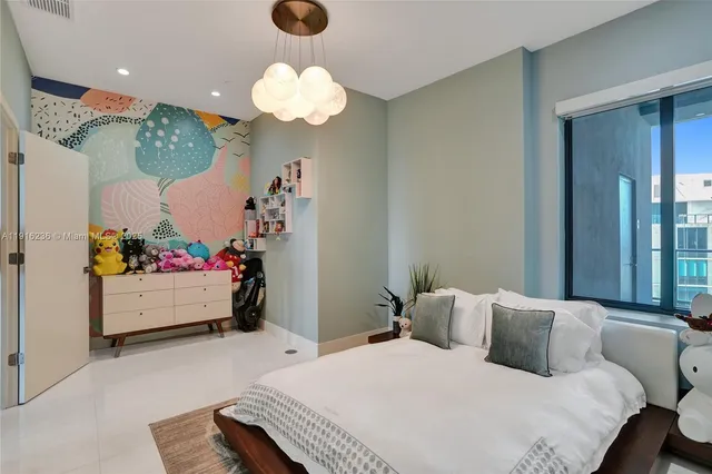a view of a living room with a sink and furniture