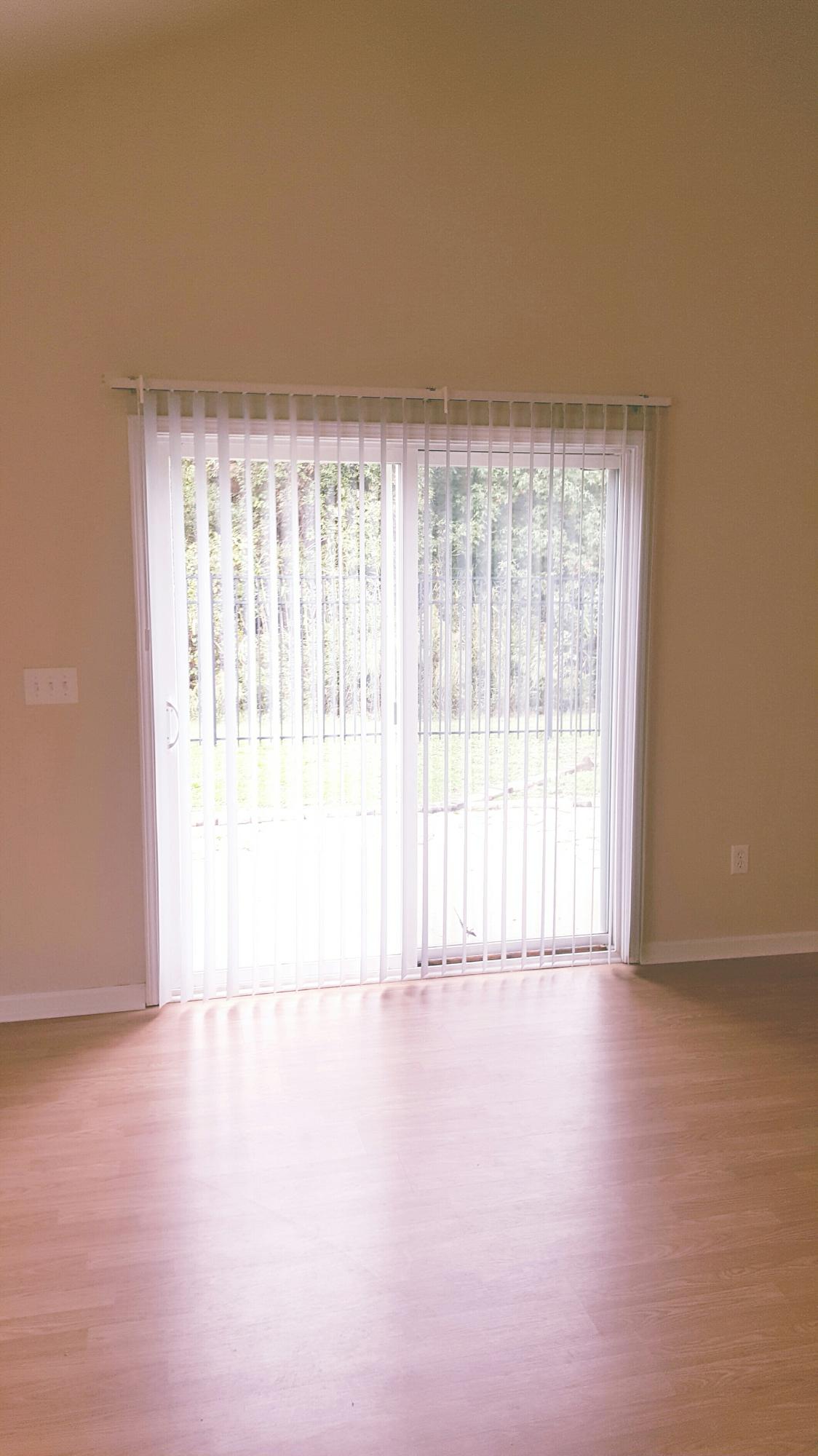9312 Ayscough Road Summerville, SC 29485 - Photo 9 of 20 Sliding door in great room