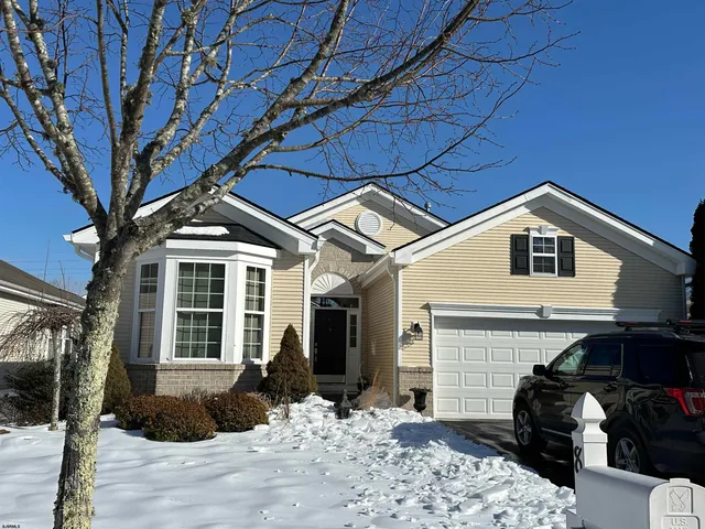a view of a house with a patio