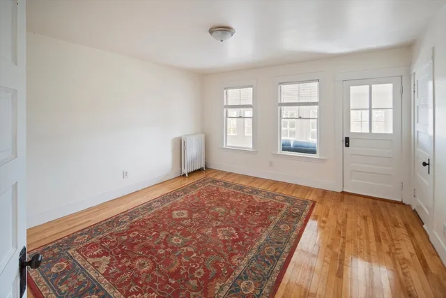 a view of an empty room and window