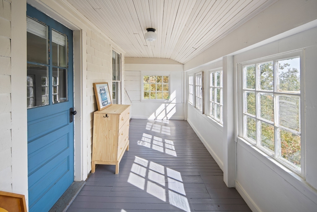 20 Mountain Road Princeton, MA 01541 - Photo 15 of 17 a view of a hallway with furniture and windows