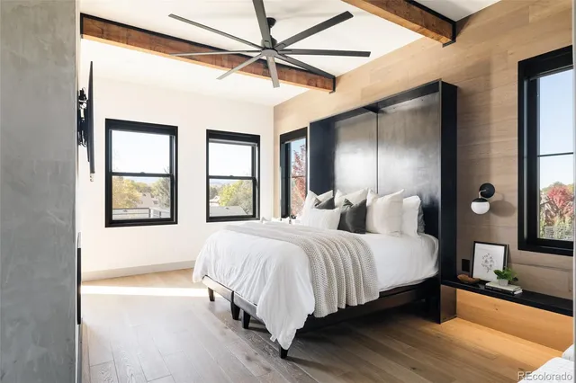 a bathroom with a double vanity sink and mirror